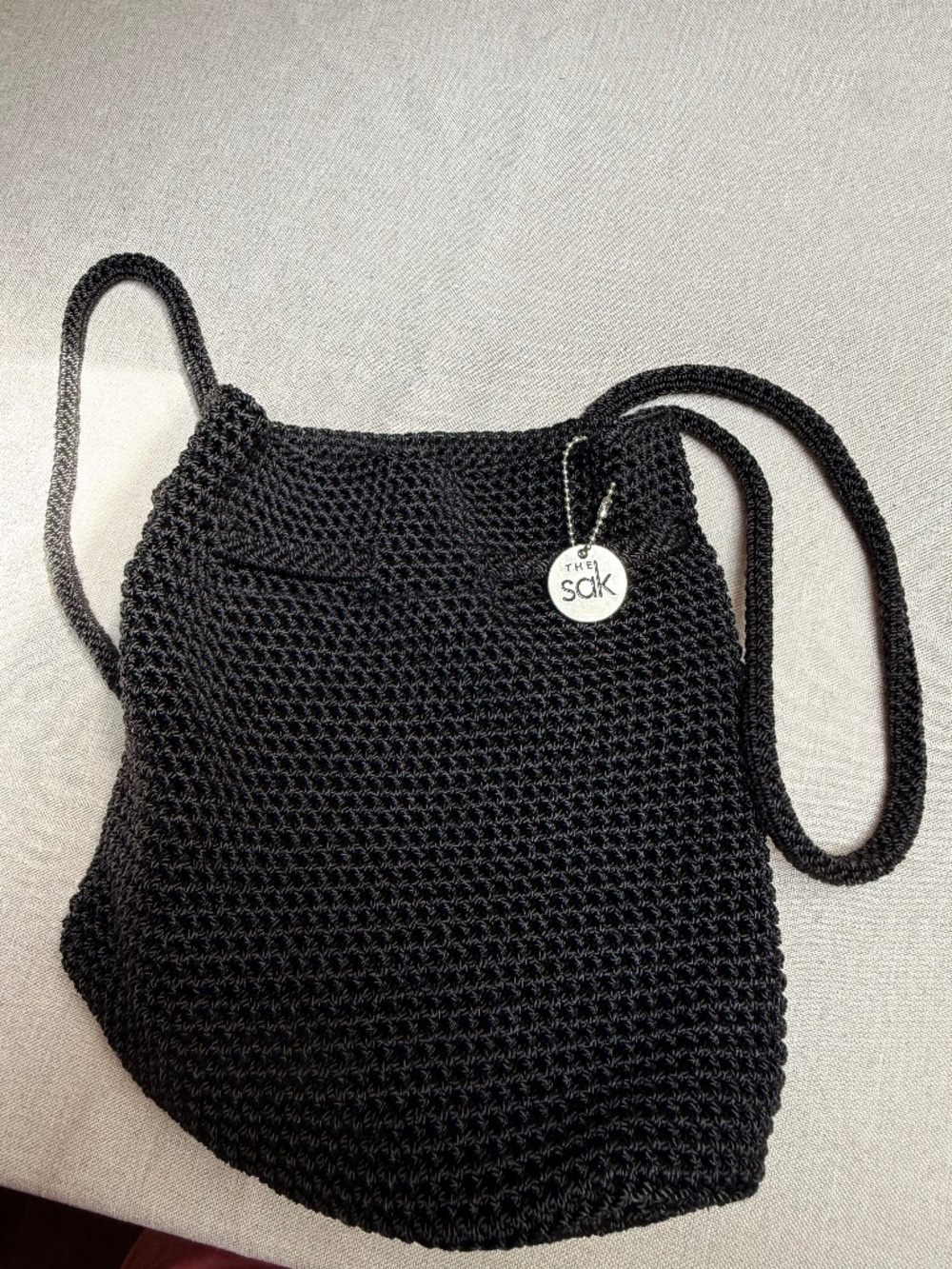 The Sak Black Woven Mini Drawstring Backpack